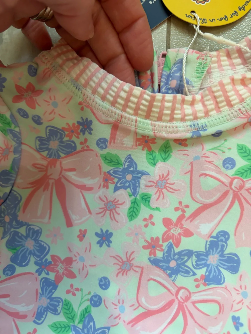 NWT RuffleButts Pastel Bow Blooms Long-Sleeve Rashguard Swimsuit Girls 3-6M